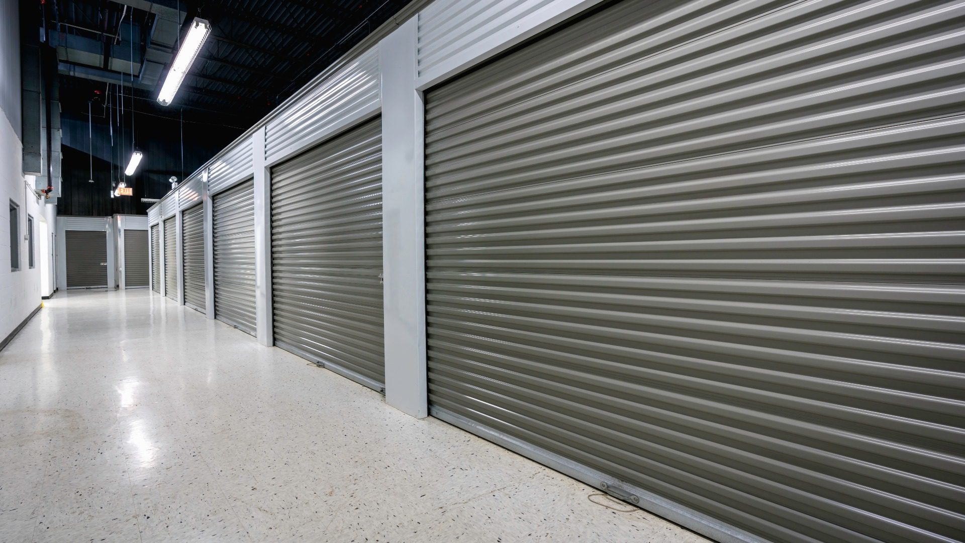 Storage facilities with gray doors. Moving, storage concept. Storage facilities with gray doors. Moving, storage concept.